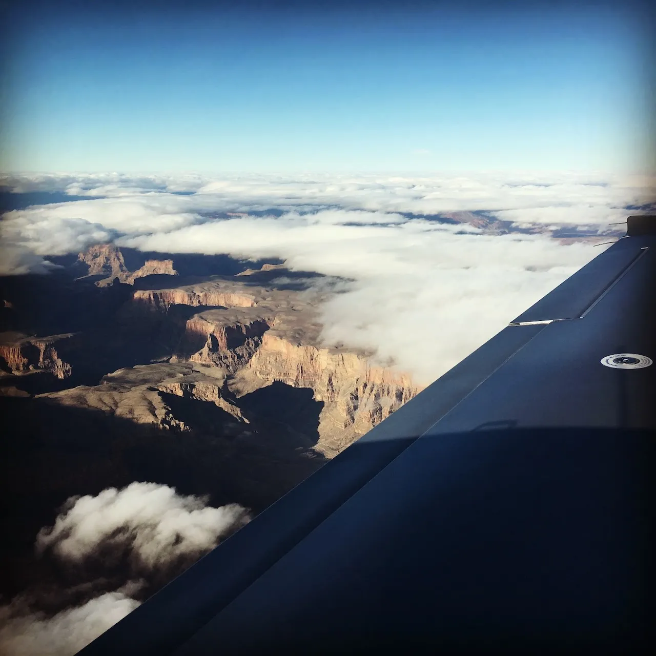 Dramatic canyon views through cloud layers on the way to Sedona