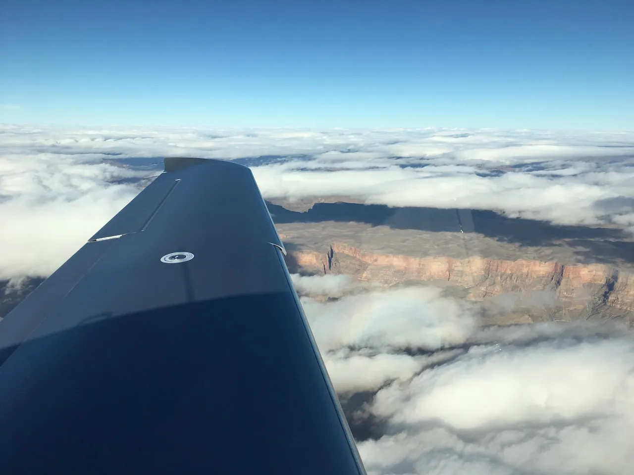 Breaking out of the clouds - first aerial views of the California canyons