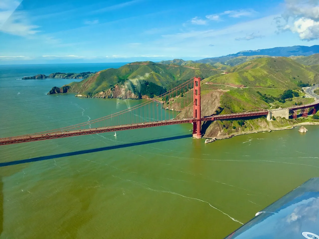 The Golden Gate Bridge in all its glory - flying over at low altitude