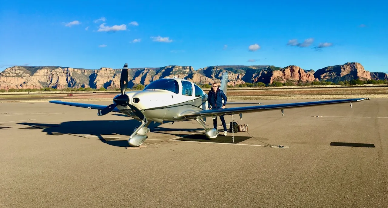 On the ramp at Sedona Airport - Cirrus SR22T G5 with the stunning red rock formations